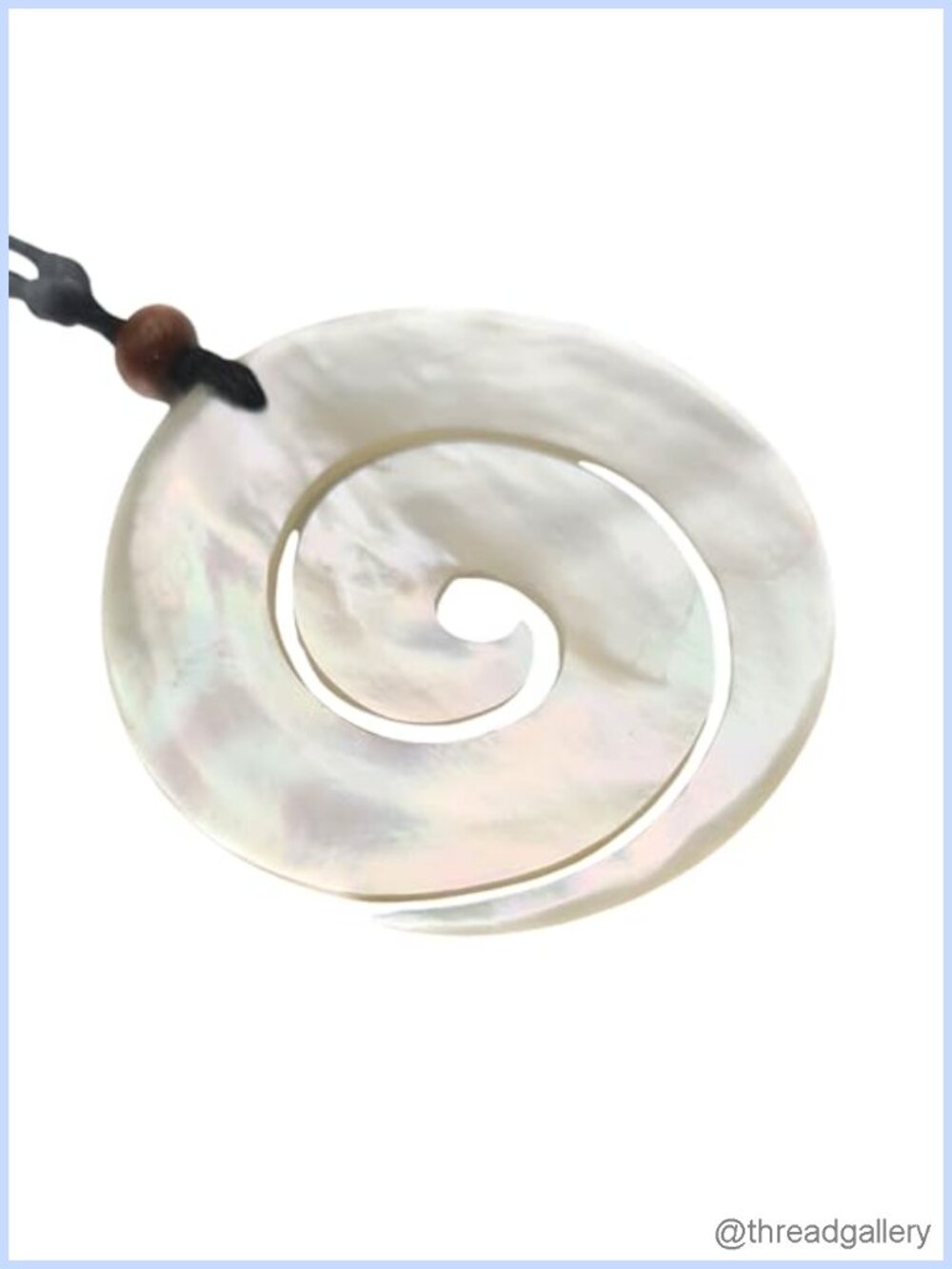 Hand Carved Spiral Mother of Pearl Pendant Necklace on Waxed Cord